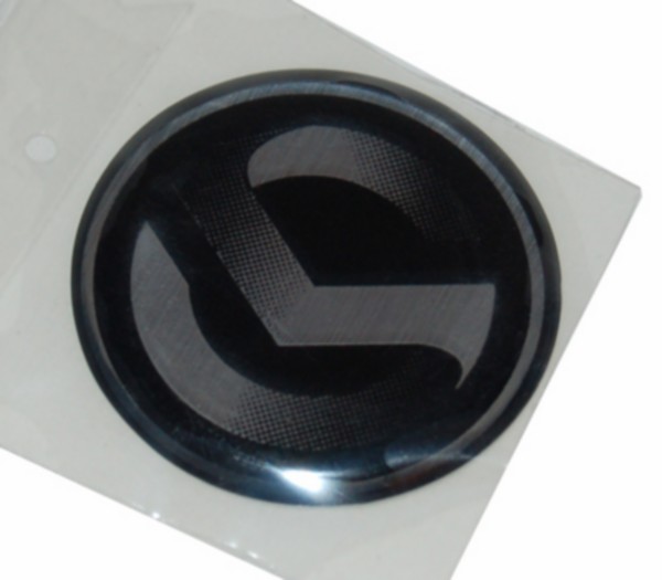sticker Sym origineel logo stuurkap 30mm mio